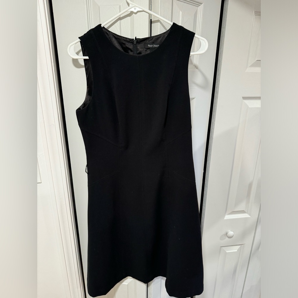 Black zip up dress with flare on bottom, Size 10